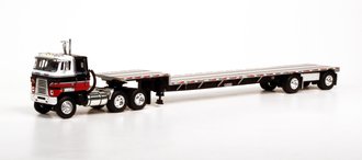 1:64 International TranStar COE (Black/Red/White) w/Spread-Axle Transcraft Stepdeck Trailer (Silver) 1:64 International TranStar COE (Black/Red/White) w/Spread-Axle Transcraft Stepdeck Trailer (Silver)