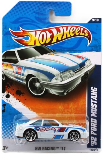1:64 1992 Ford Mustang (White w/ Blue & Red Sripes) 1:64 1992 Ford Mustang (White w/ Blue & Red Sripes)