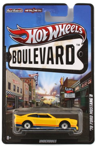 1:64 Boulevard - 1978 Ford Mustang 11 (Yellow w/Blue Stripes)